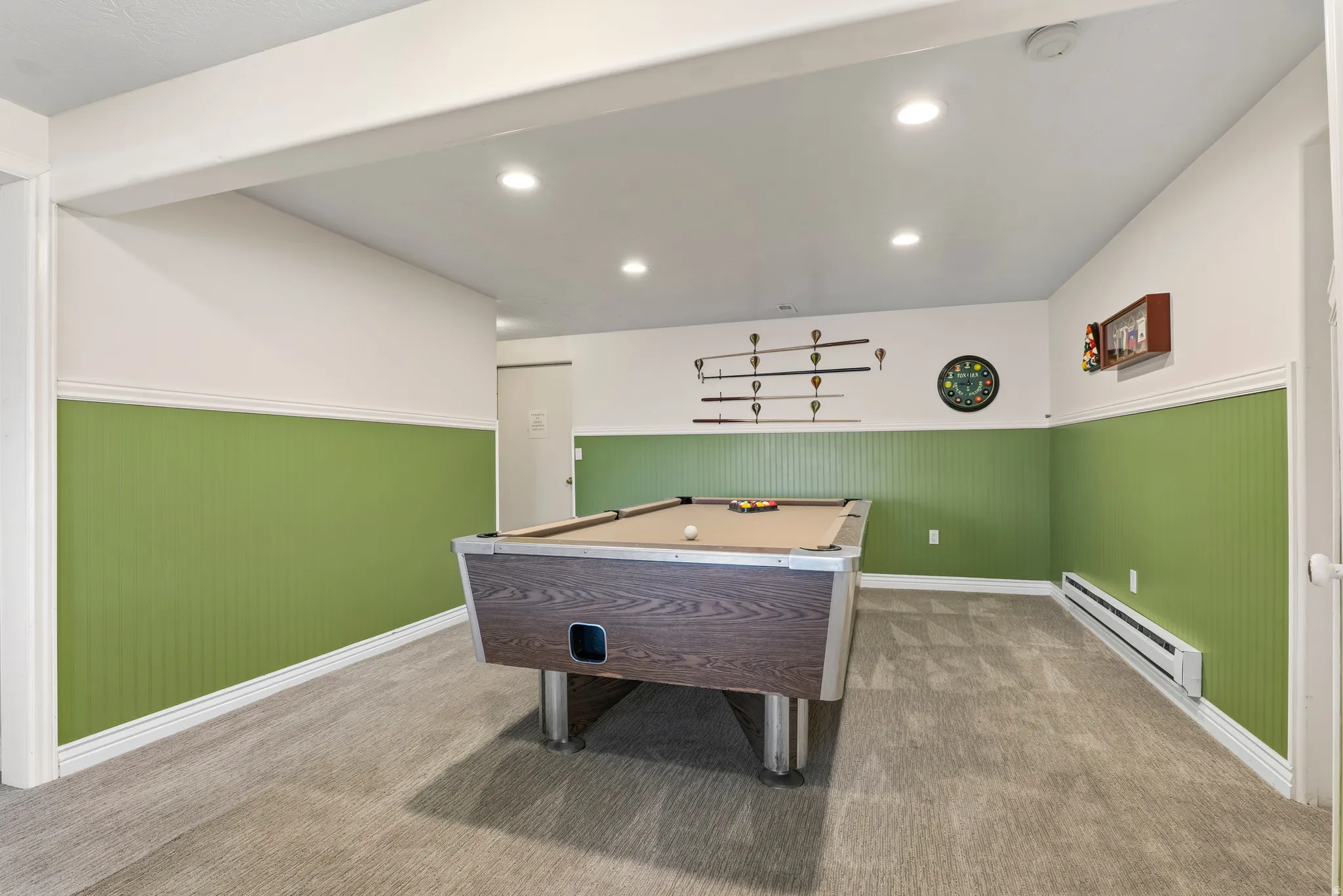 Game room featuring wainscoting, pool table, baseboard heating, recessed lighting, and wood walls