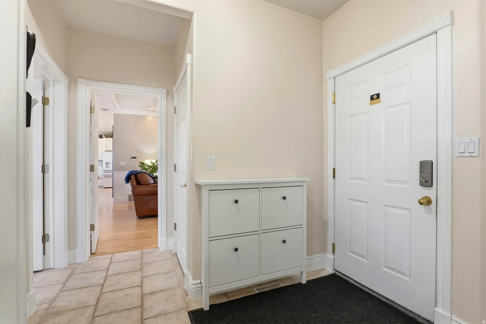 Foyer with baseboards