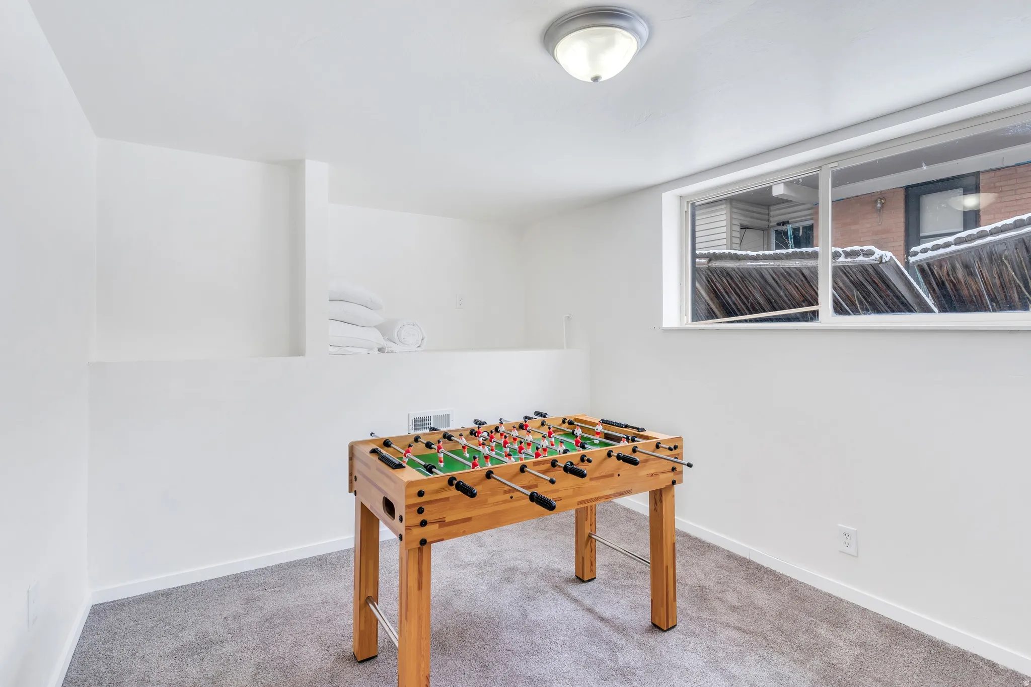 Recreation room with carpet