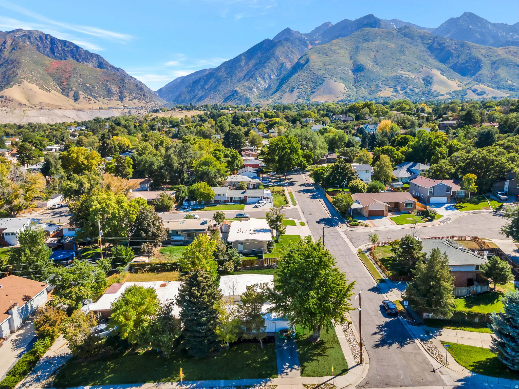 Aerial view of residential area with a mountainous background
