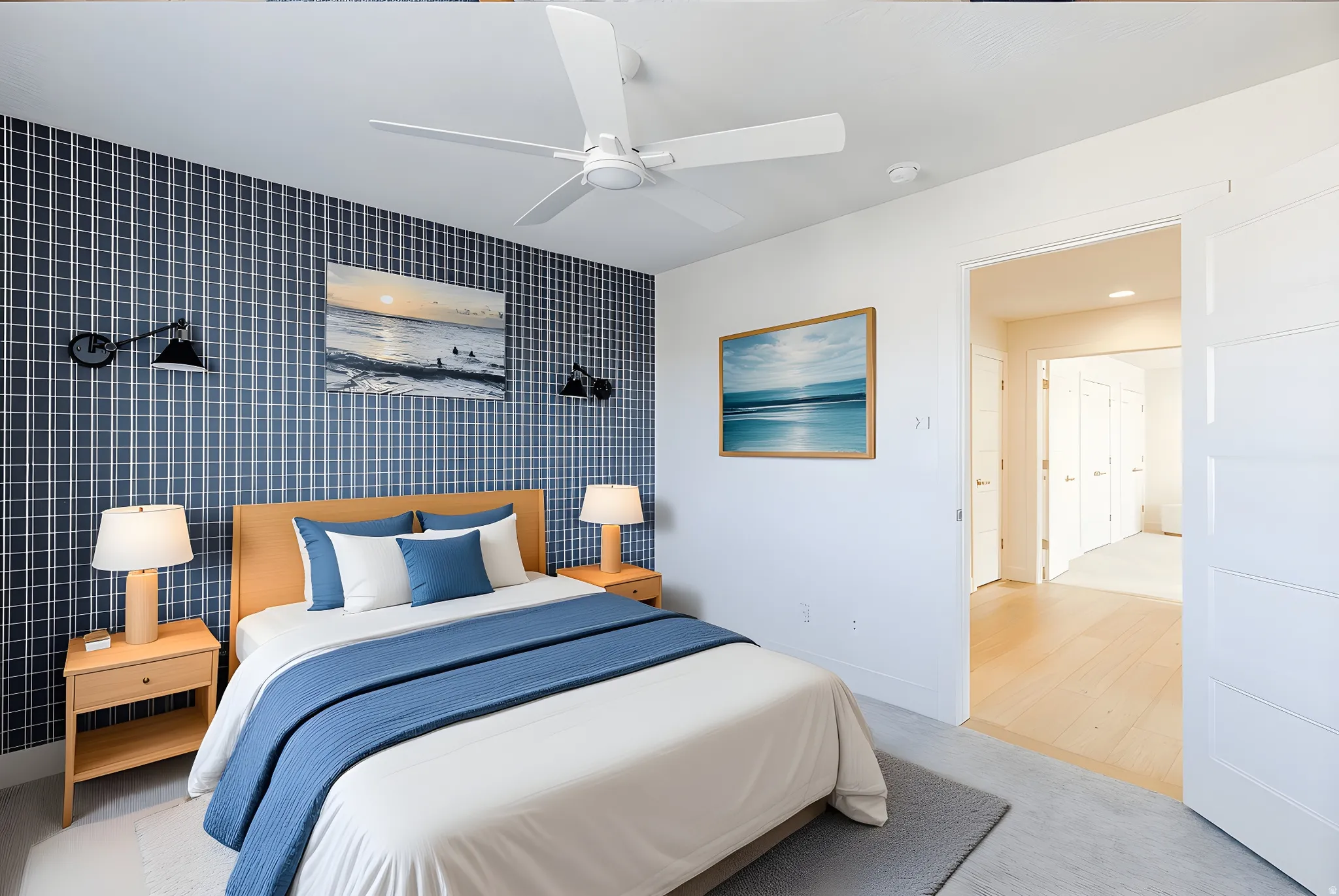 Bedroom with an accent wall, light colored carpet, and ceiling fan