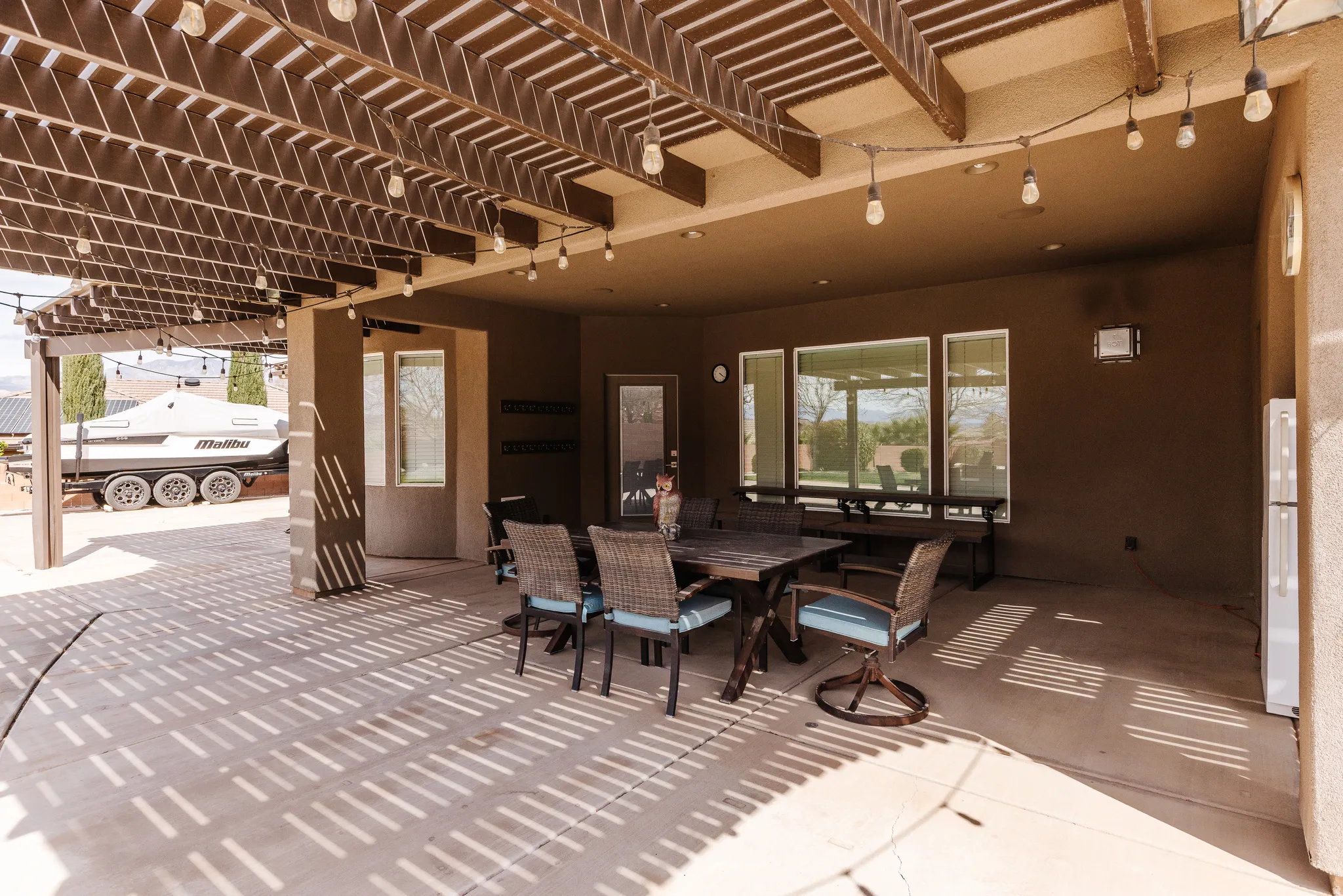 View of patio featuring a pergola and outdoor dining space