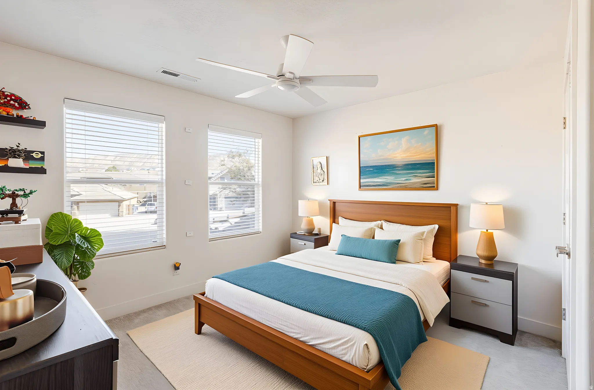Bedroom featuring a ceiling fan and light carpet