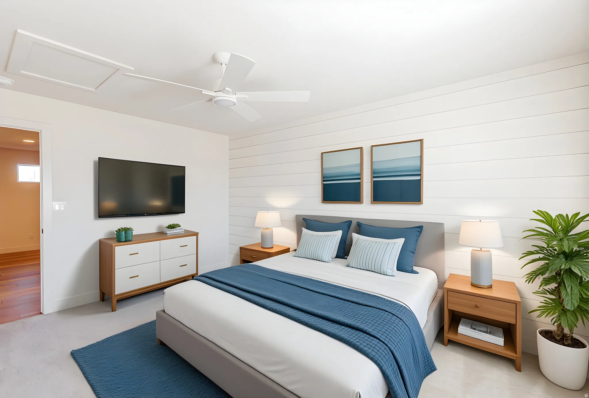 Bedroom featuring ceiling fan and light carpet