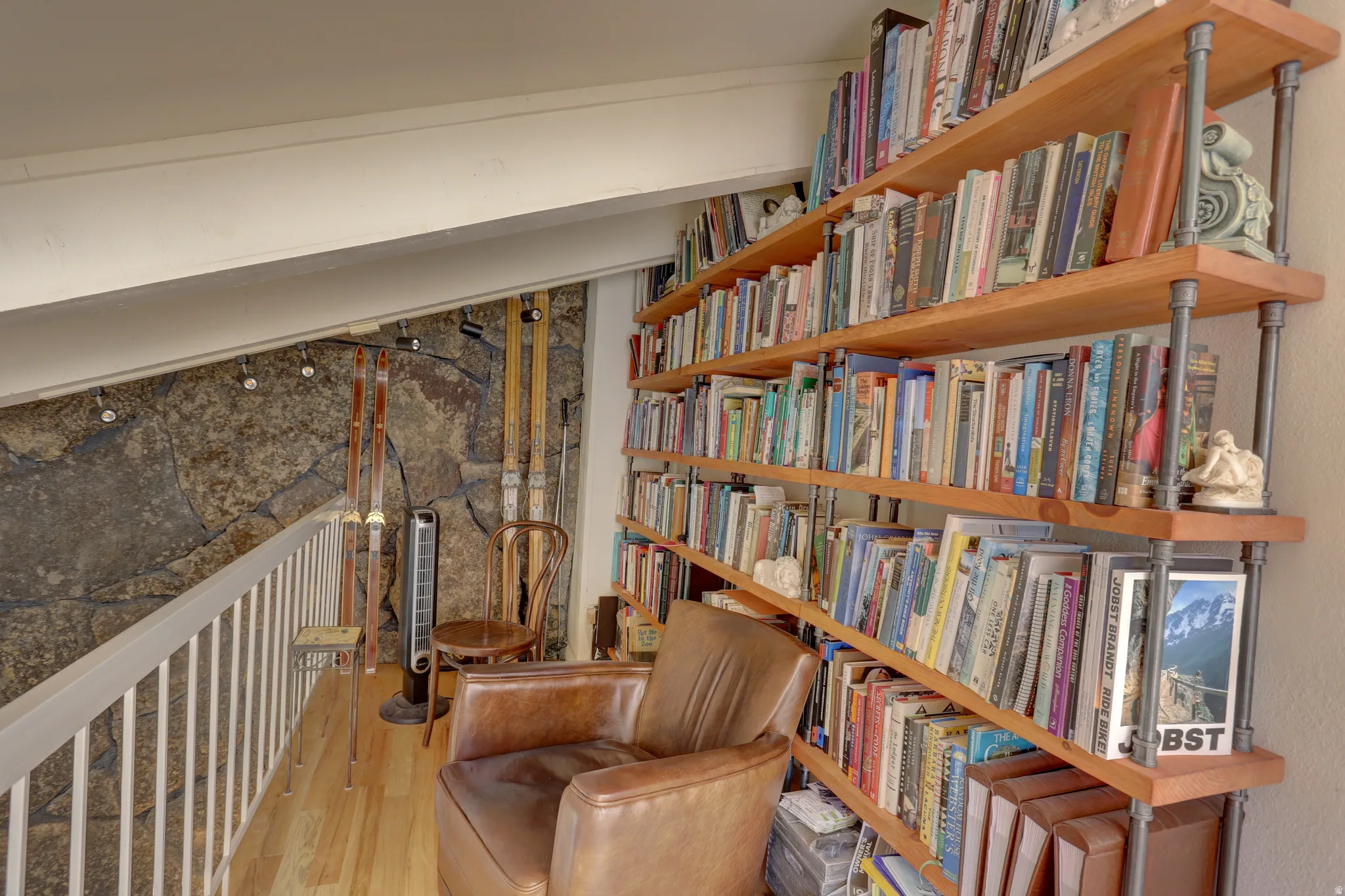Living area with hardwood / wood-style floors