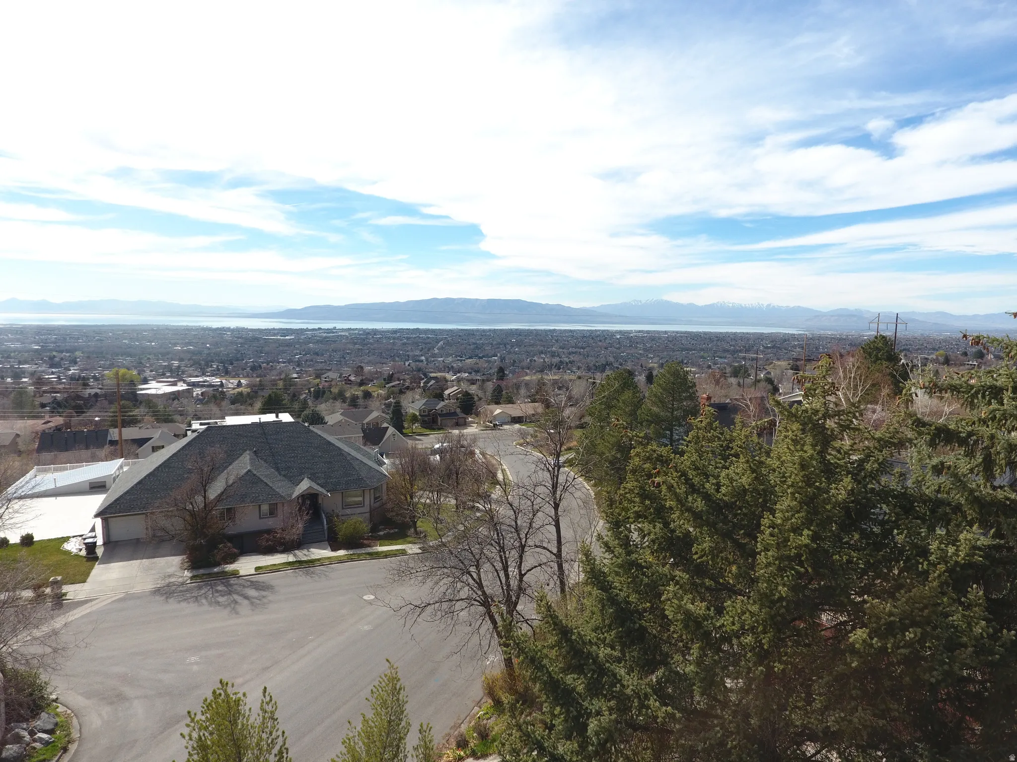 View of mountain background featuring nearby suburban area
