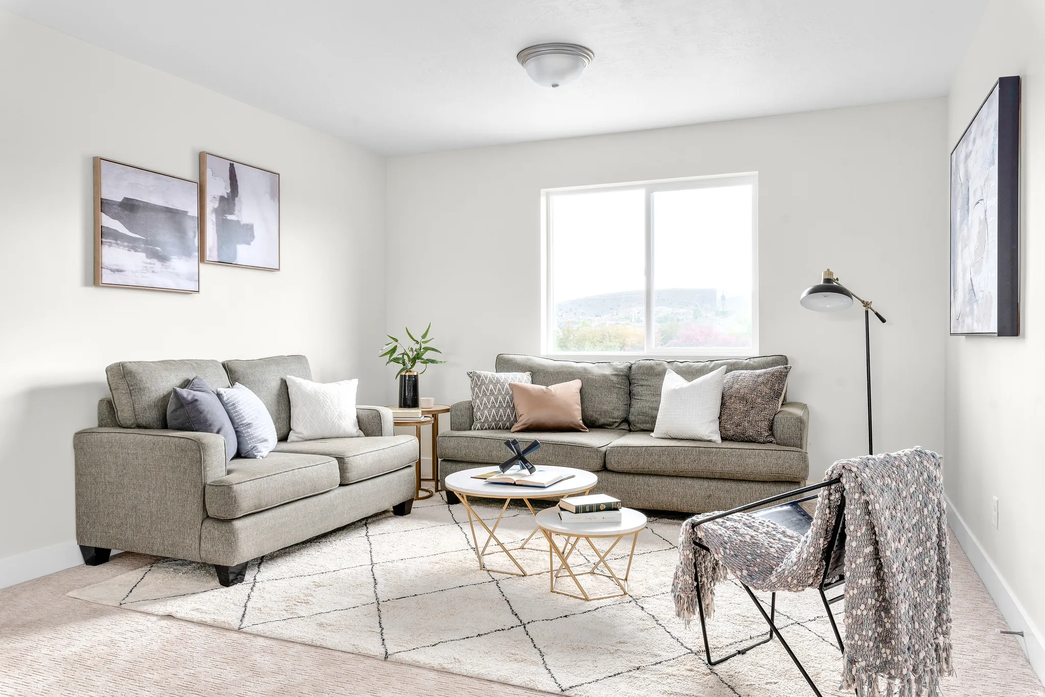 Living area with carpet and baseboards