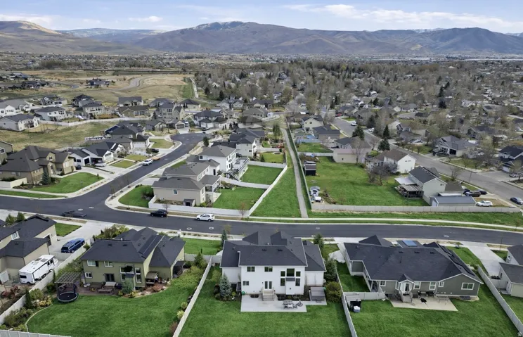 Aerial view of residential area with a mountain backdrop