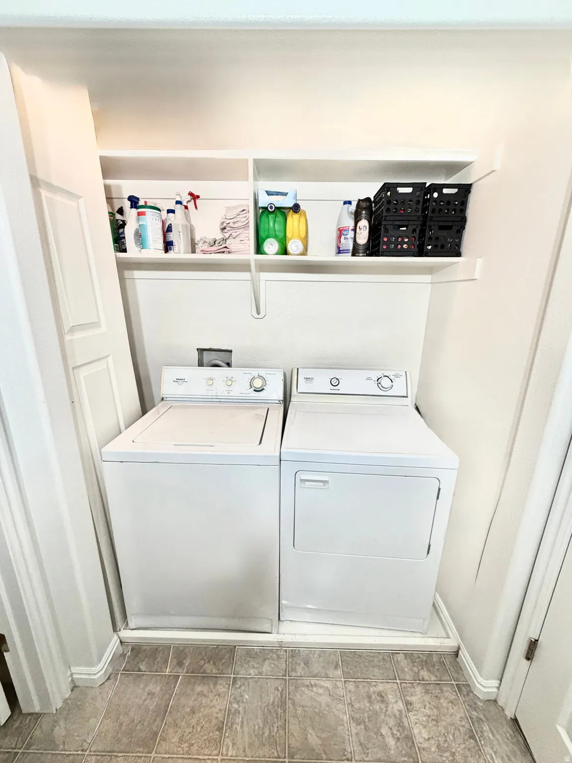 Laundry area featuring washer and clothes dryer