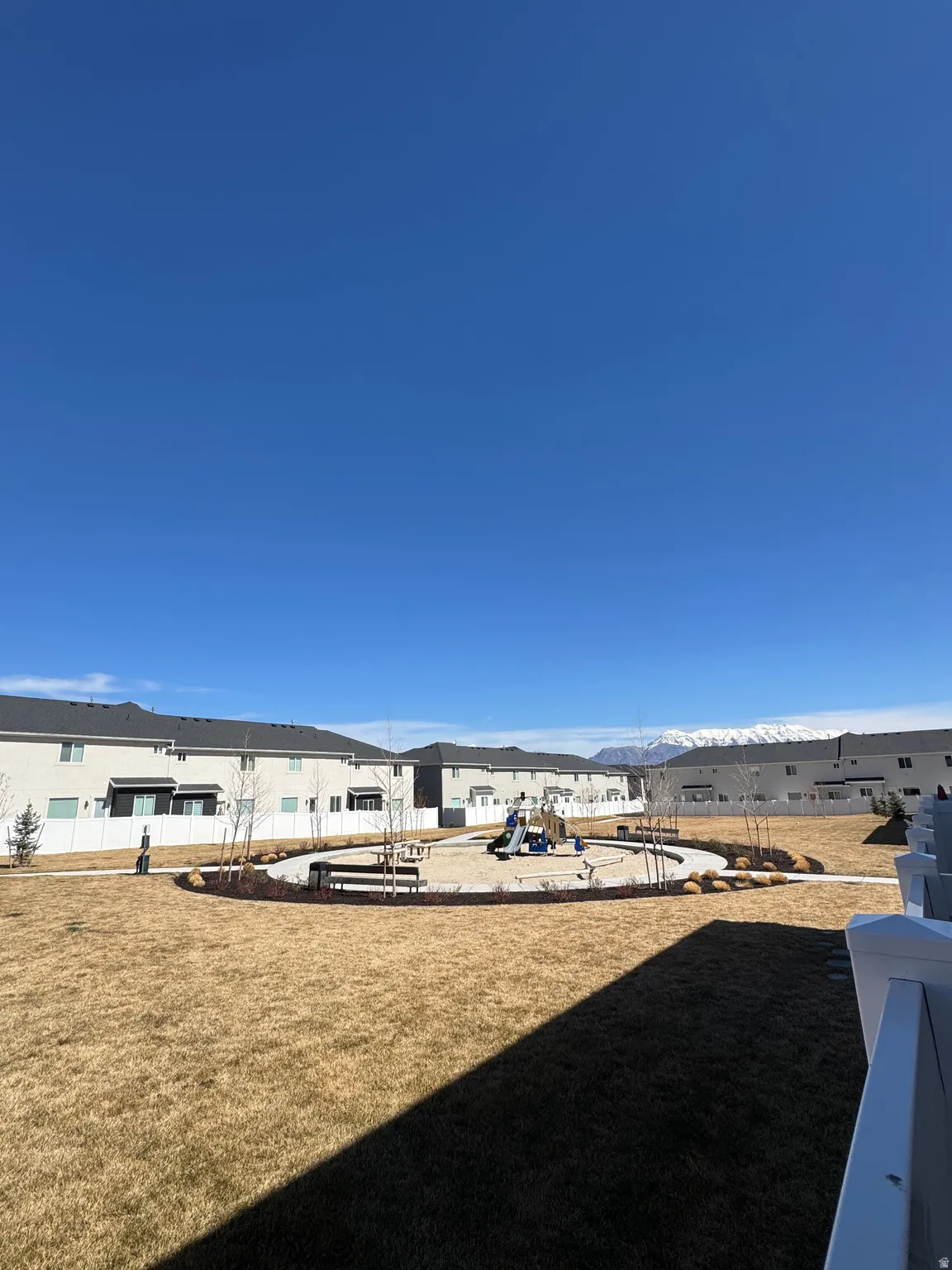 View of grassy yard with a patio