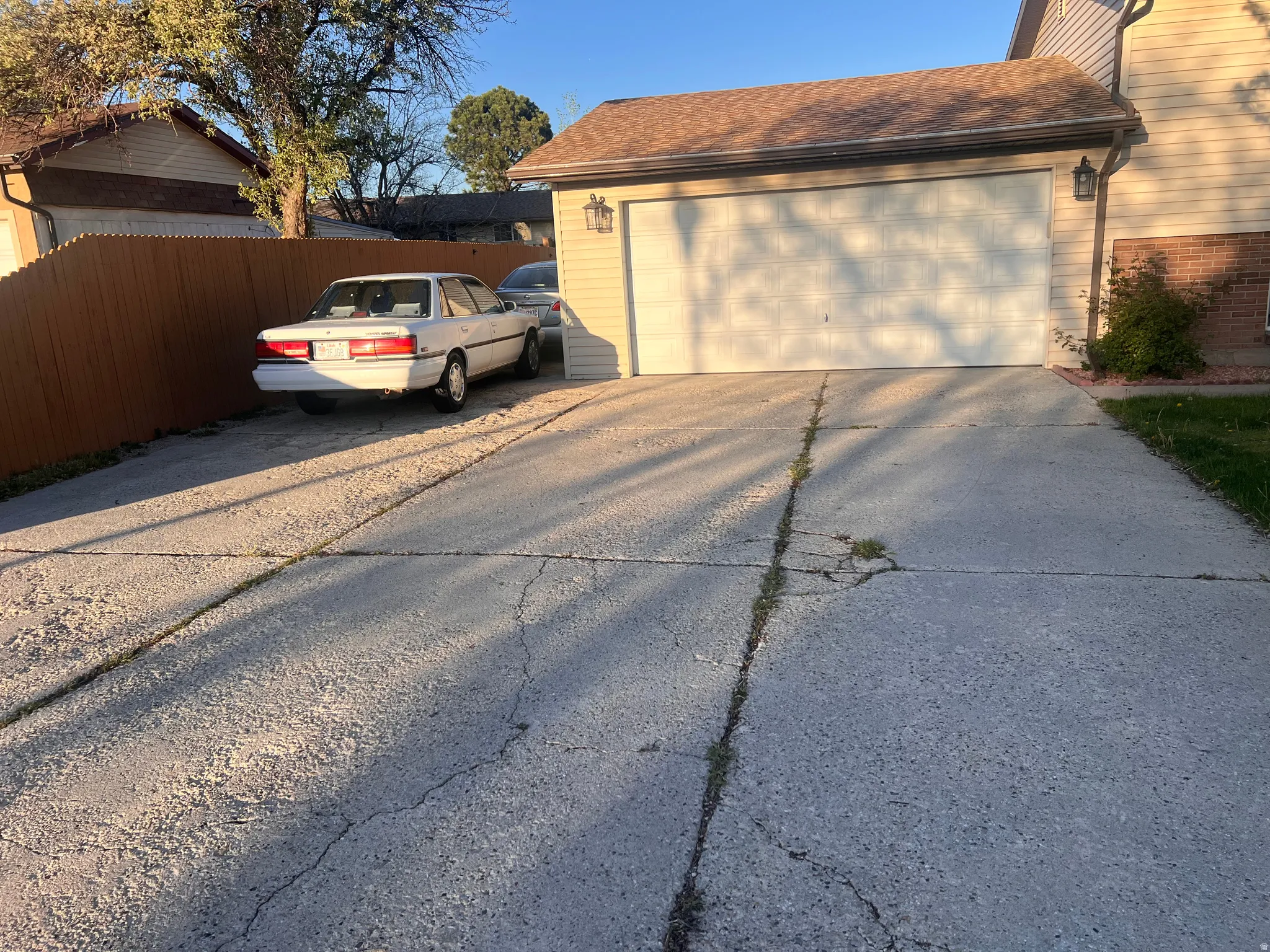 Garage with concrete driveway