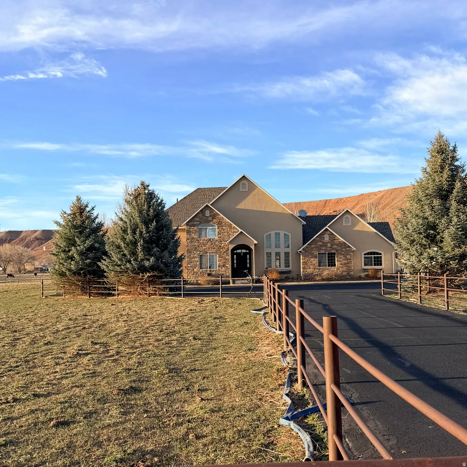 View of front of house featuring stone siding