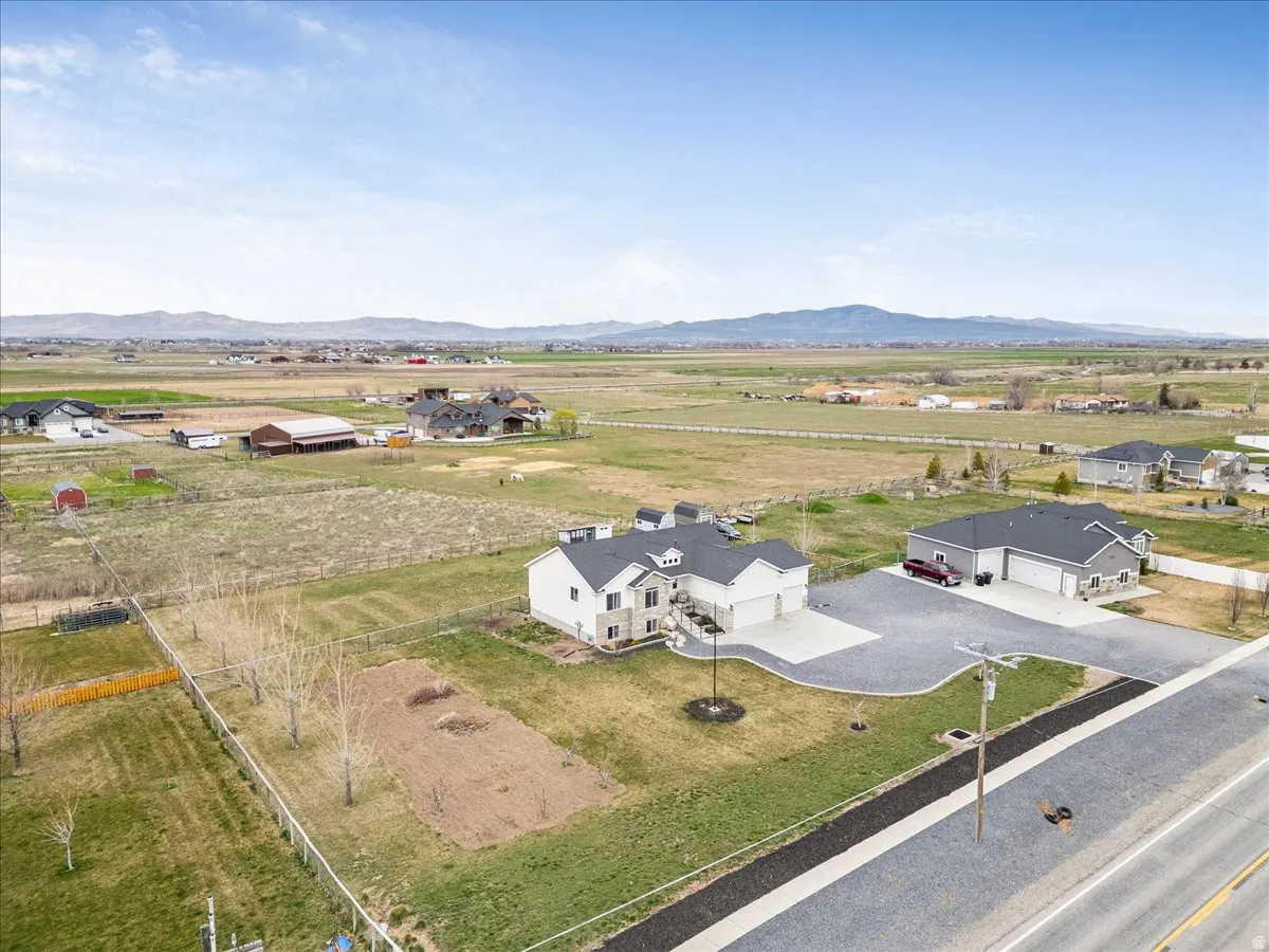 Overview of rural landscape with a mountain backdrop