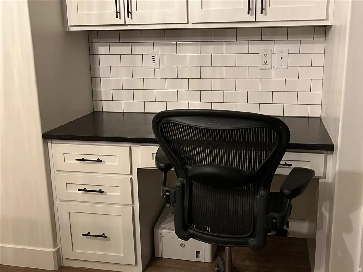 Office area featuring built in study area