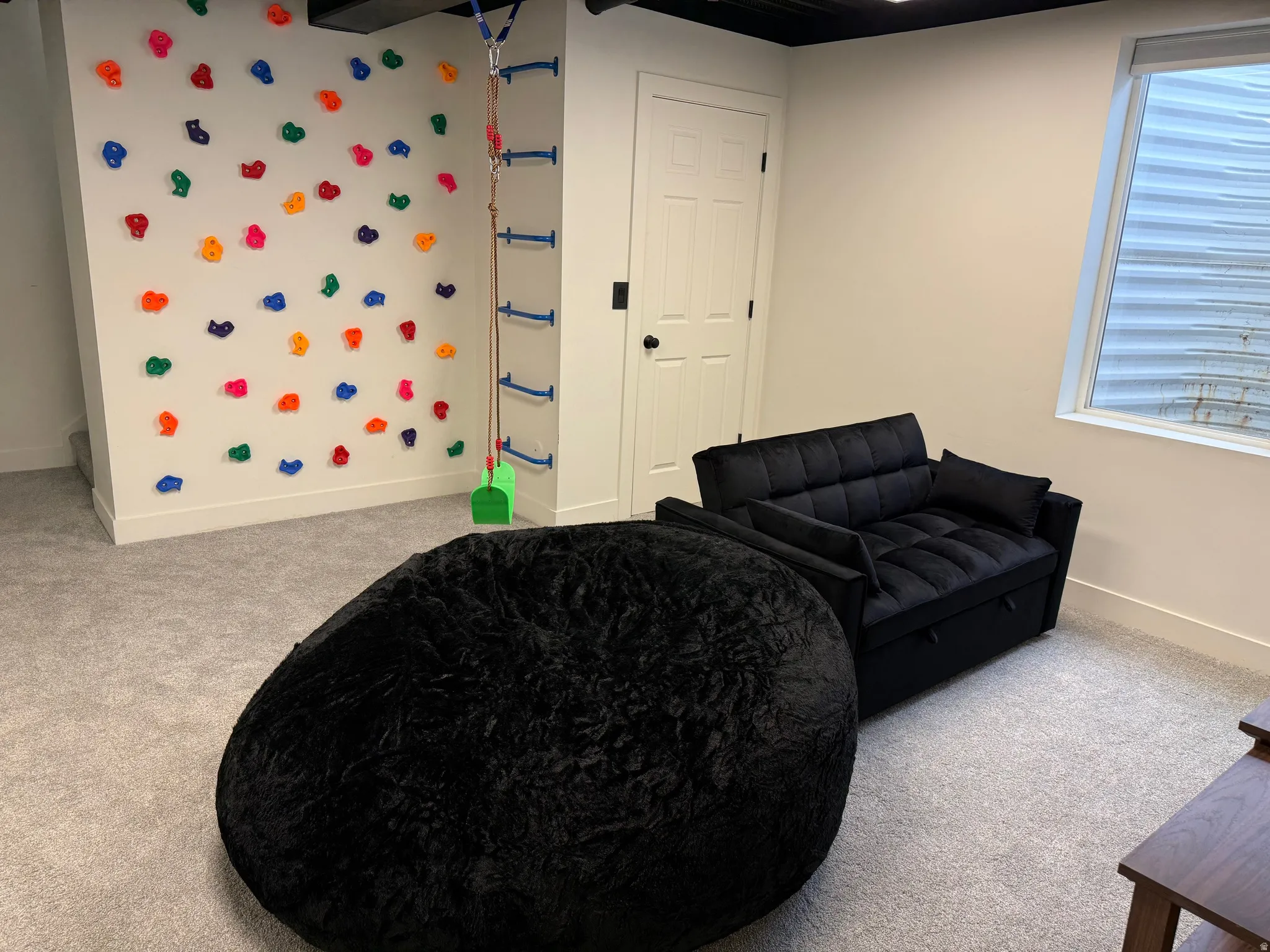 Bedroom/Rec room light carpet and baseboards