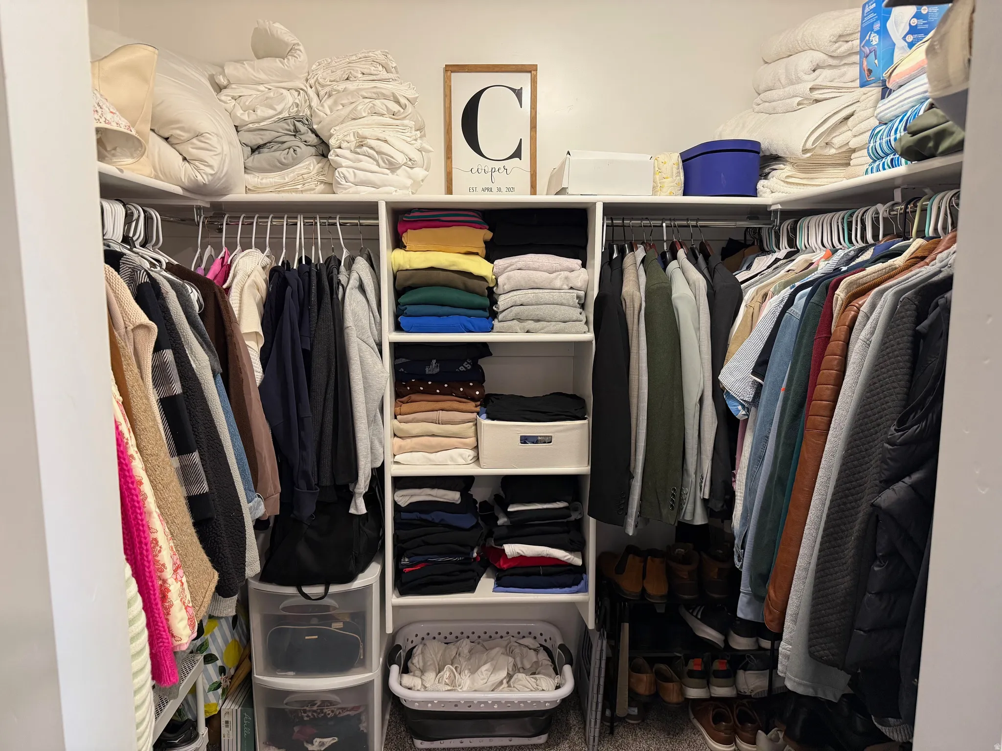 View of master walk in closet
