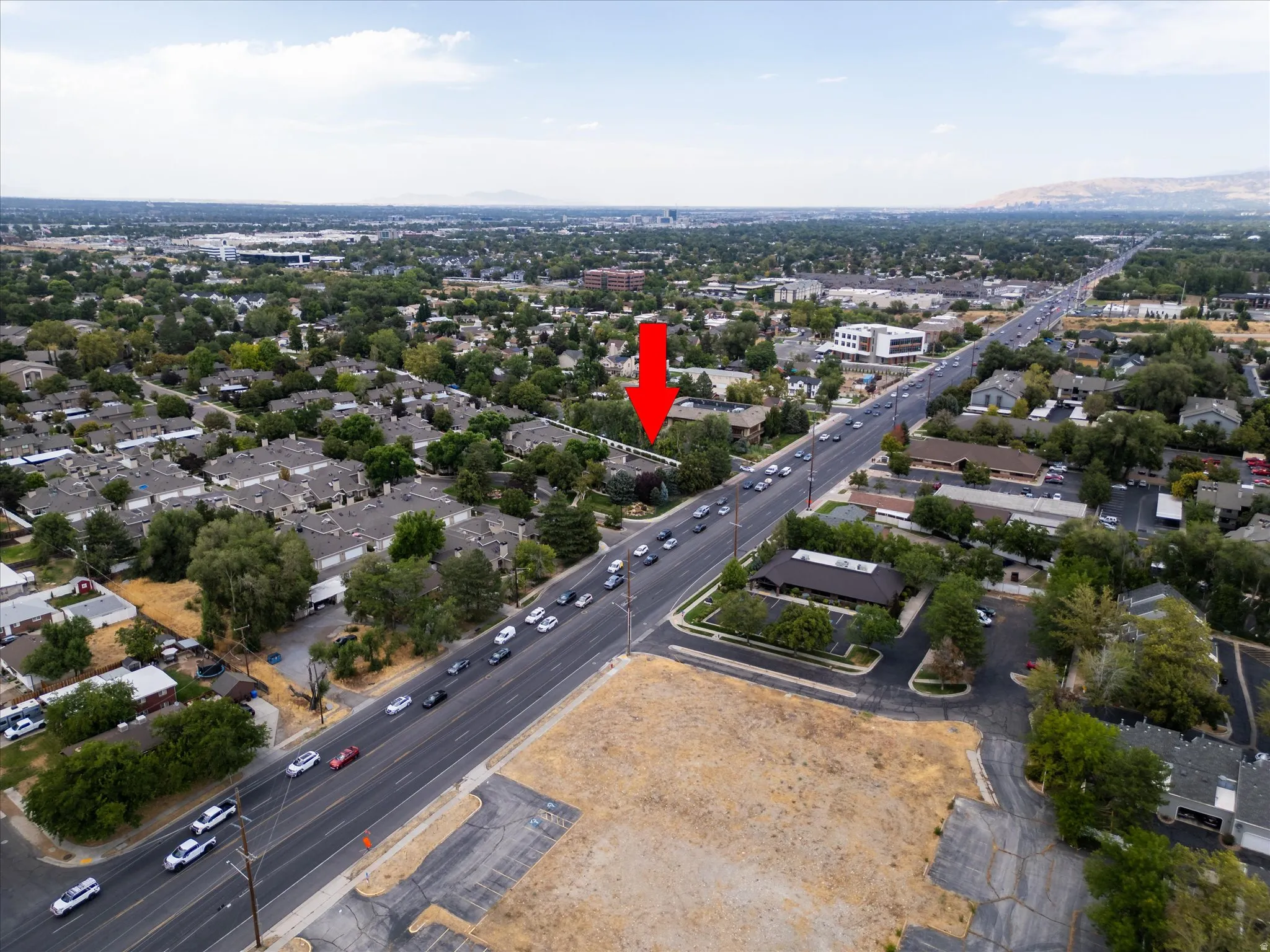 Wide view of the surrounding area highlighting convenient access to major roads, local businesses, and nearby residential neighborhoods.