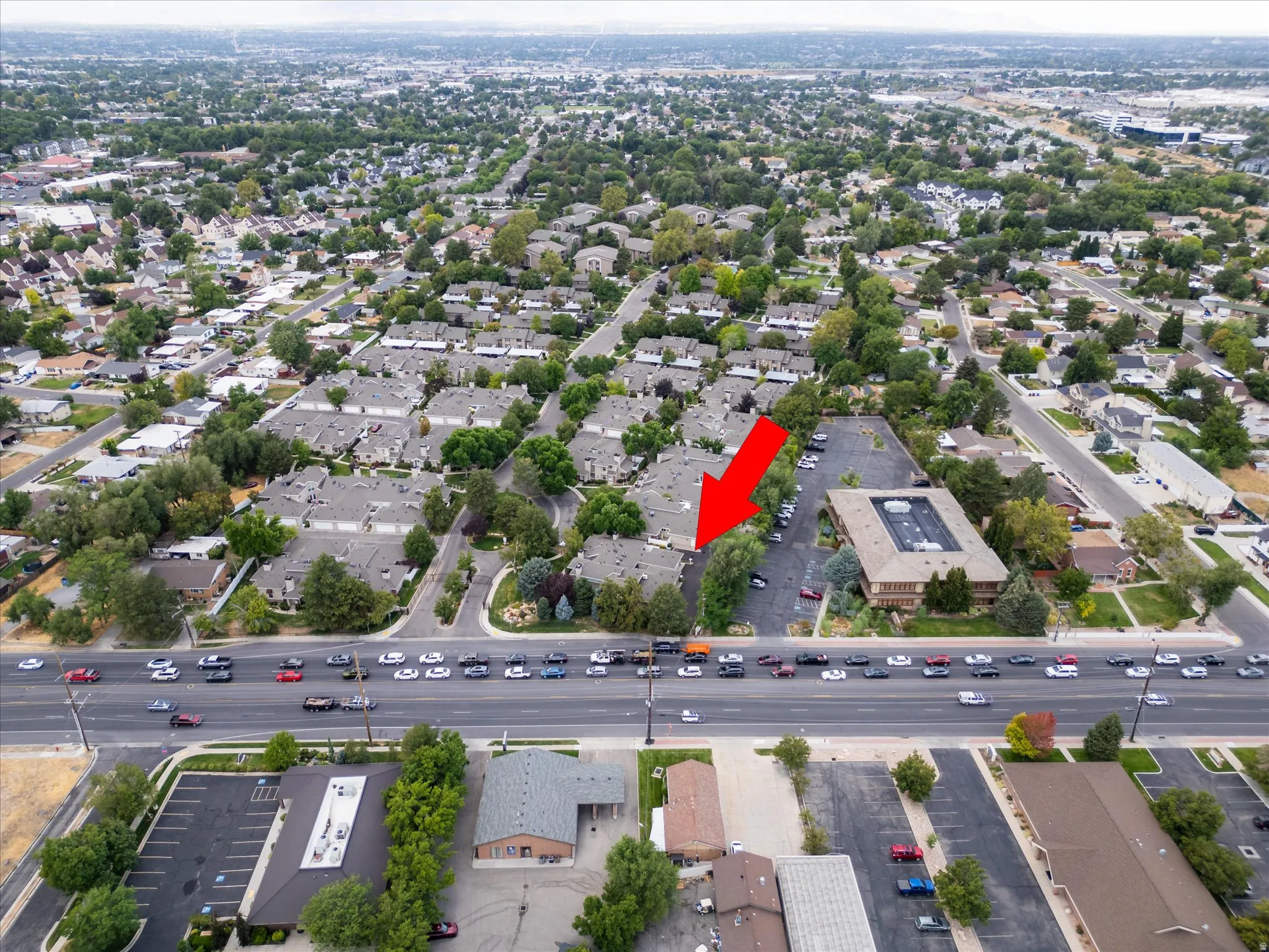 xpansive overhead view showing the broader neighborhood, nearby commercial areas, and convenient connectivity throughout the area.