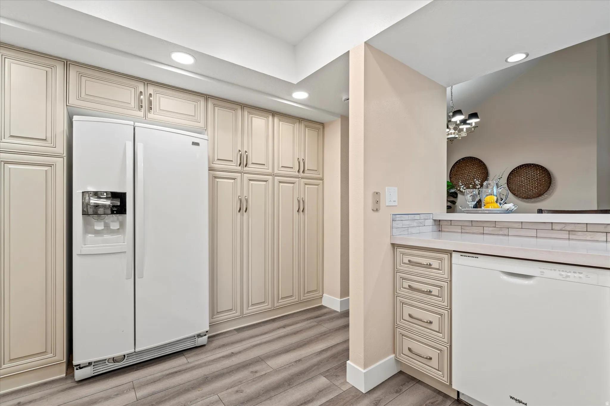 Extensive cabinetry and built-in storage provide excellent organization, along with a full-size refrigerator and additional prep space.
