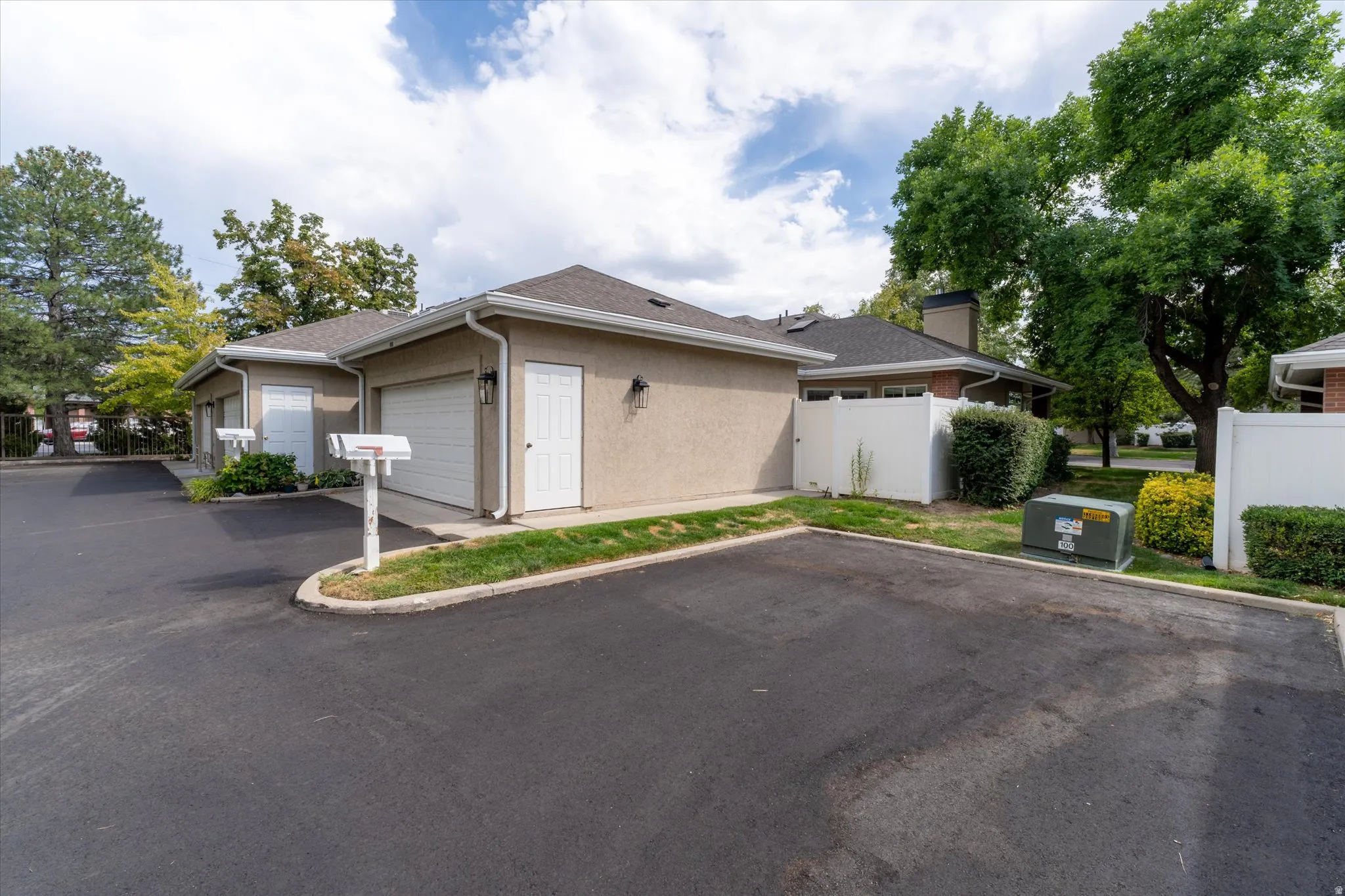 Clean and well-kept garage structure with nearby parking and easy access to the unit.