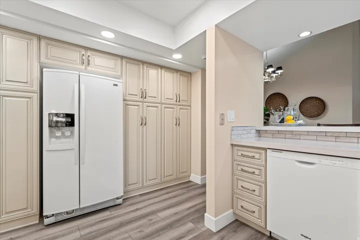 Extensive cabinetry and built-in storage provide excellent organization, along with a full-size refrigerator and additional prep space.