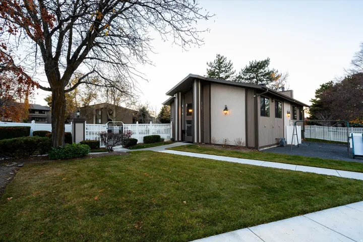 Nicely landscaped common areas with sidewalks and green space, creating a peaceful, park-like setting throughout the community.