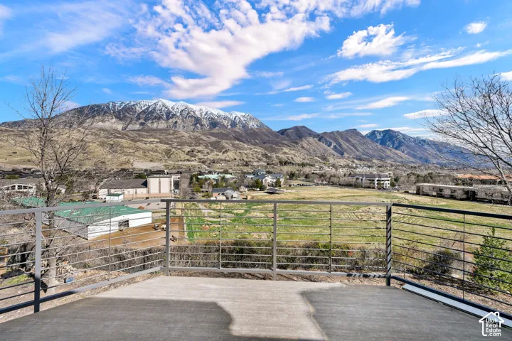 View of mountain background featuring nearby suburban area