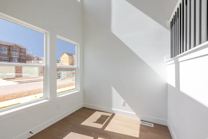 Bright interior space with multiple windows and high ceilings