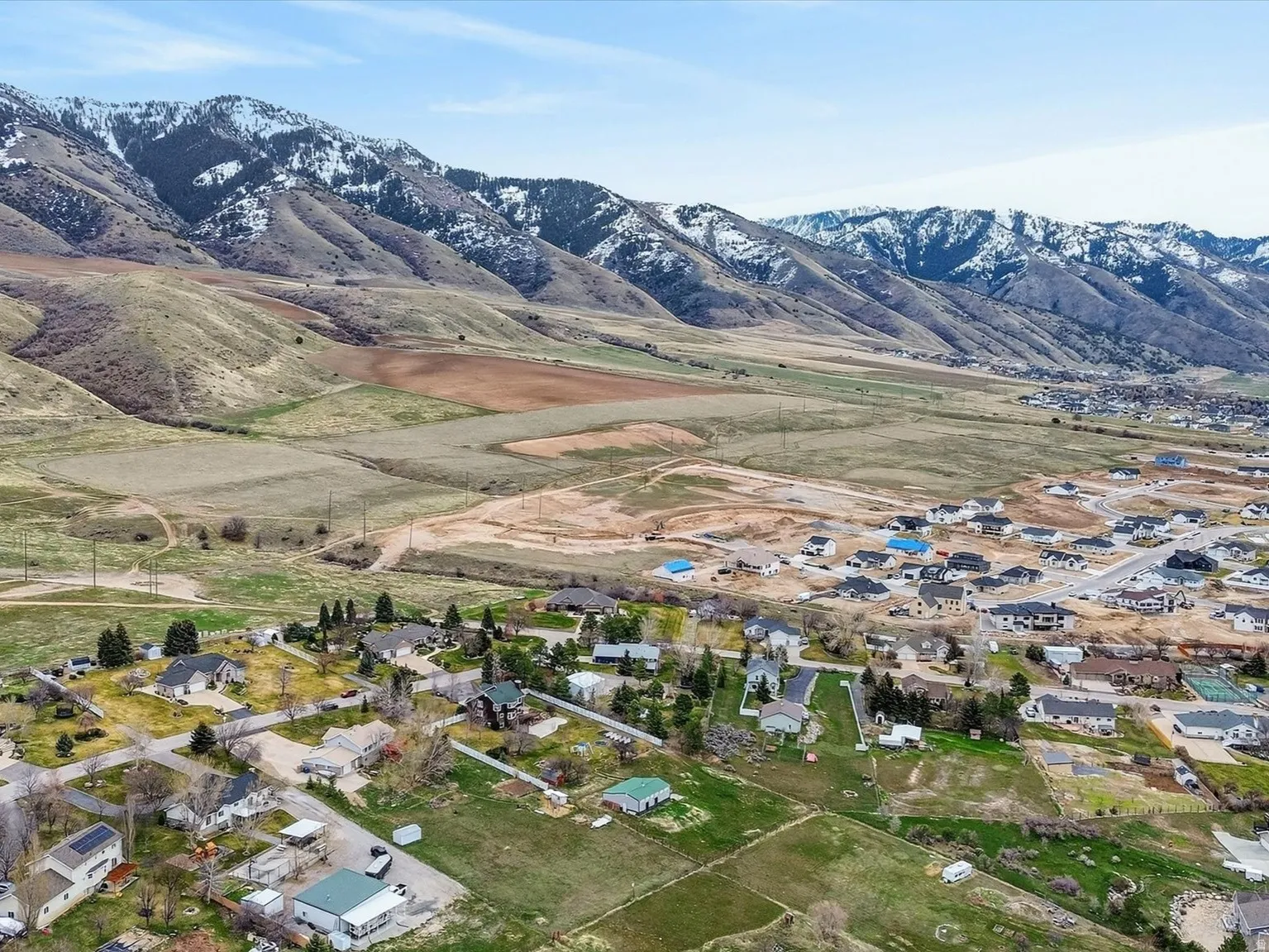 Aerial perspective of suburban area with mountains