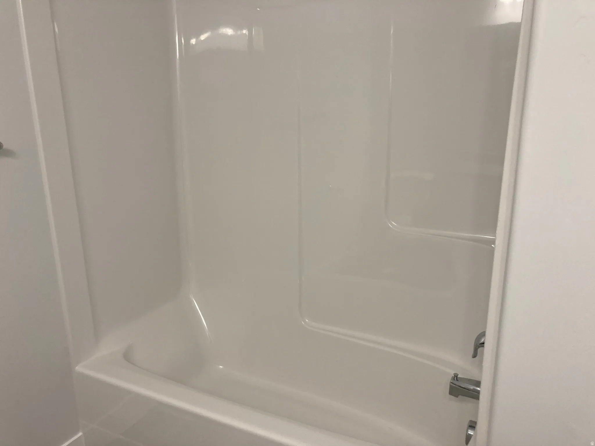 Bathroom featuring tub / shower combination