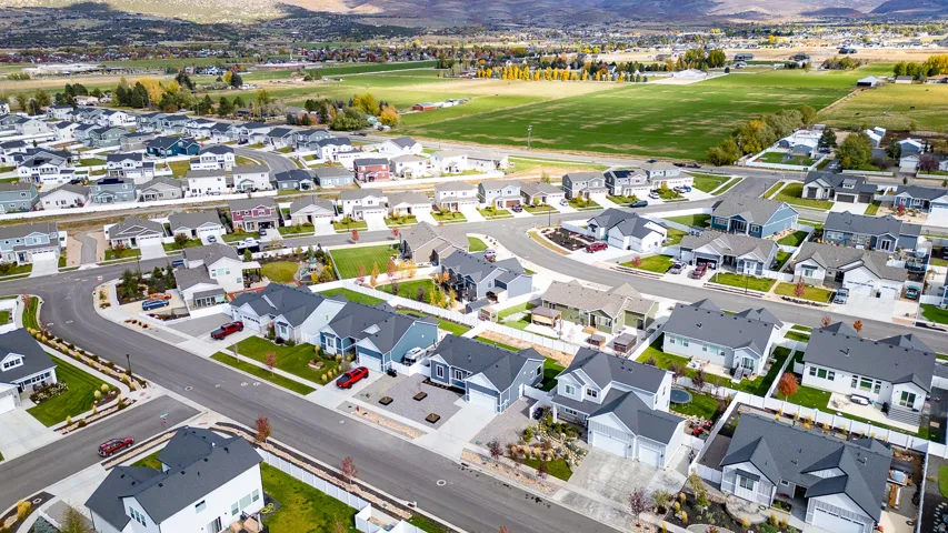 Aerial view of residential area featuring mountains