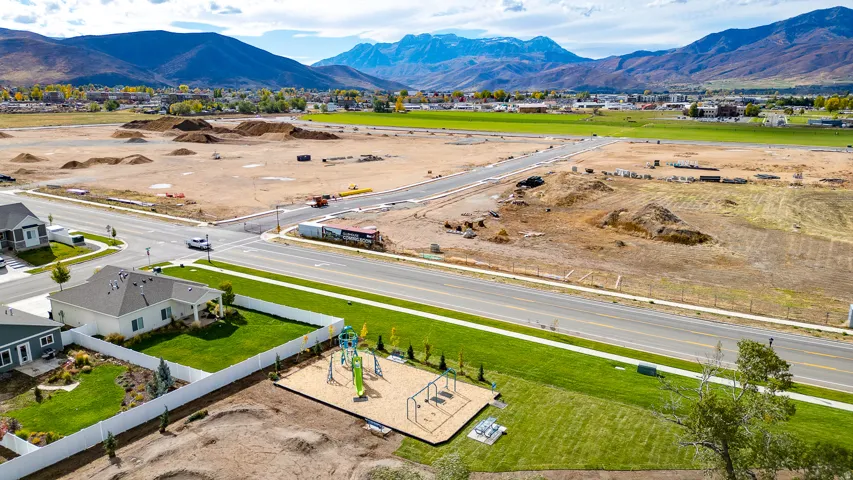 Aerial view of residential area featuring mountains