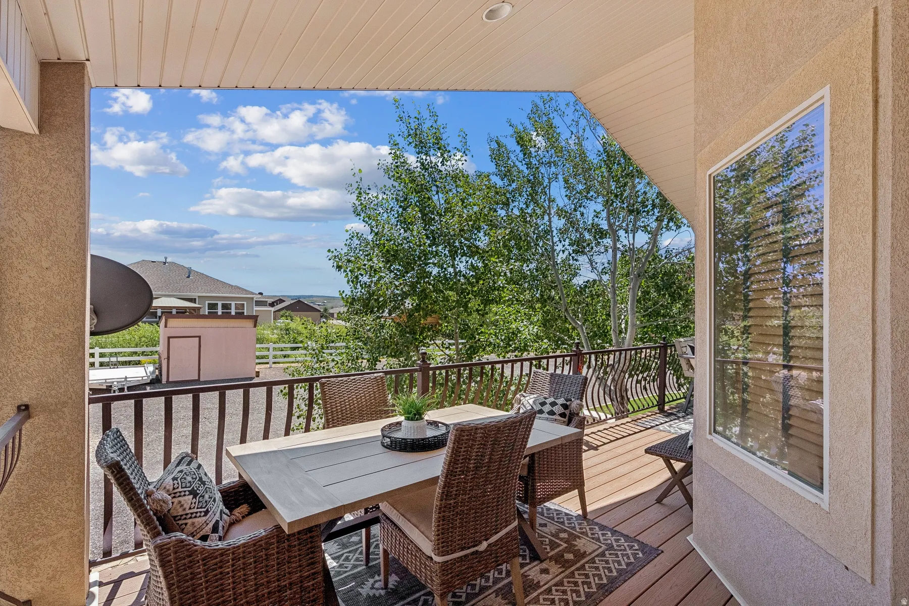 Wooden deck featuring outdoor dining space