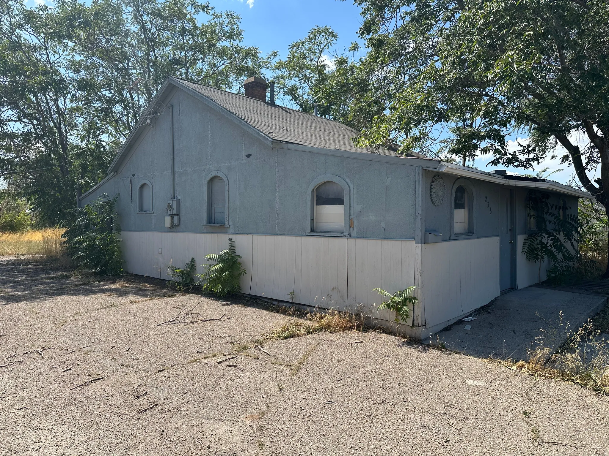 View of home's exterior with a chimney