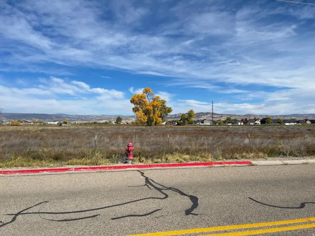 View of asphalt road featuring a mountain view
