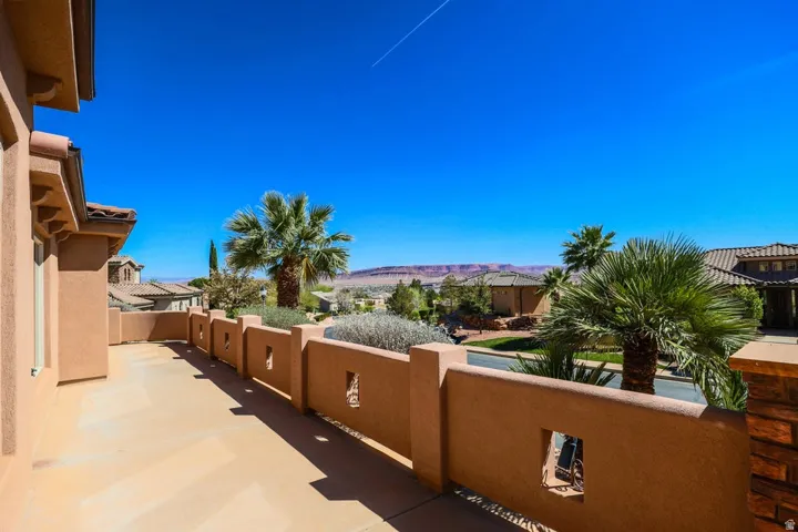 Outdoor terrace with stucco walls and decorative openings
