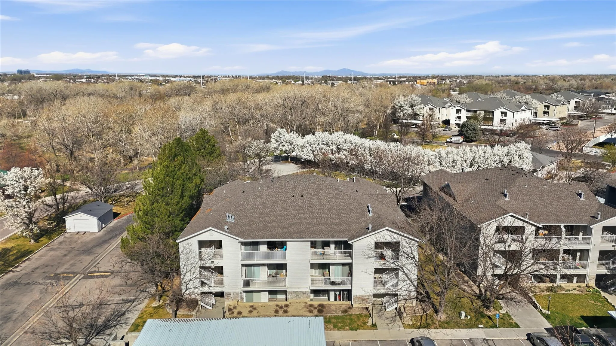 Aerial view of a mountain backdrop and Condo complex