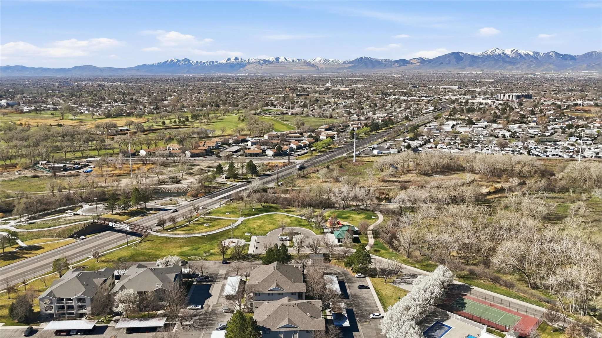 Aerial view of residential area featuring a mountain backdrop