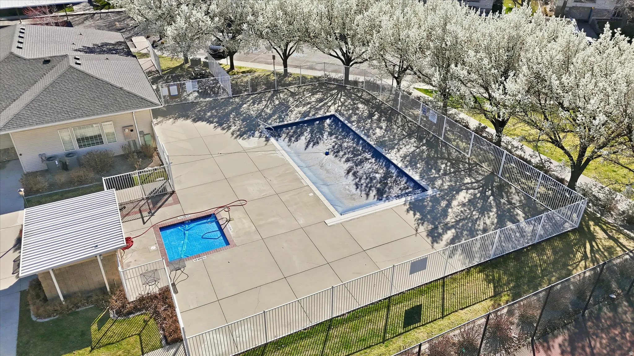 Drone / aerial view of a pool area