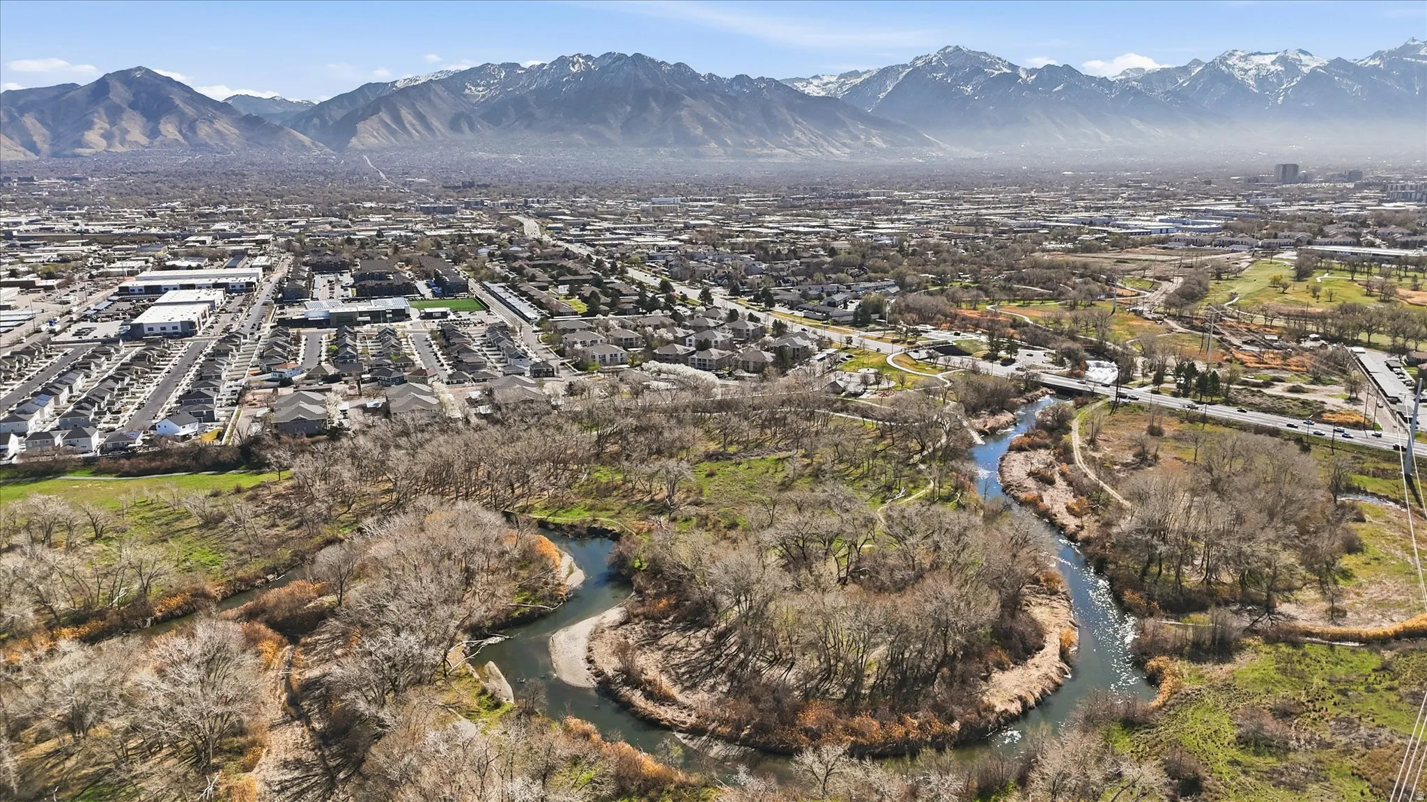 Aerial view of residential area with a mountainous background