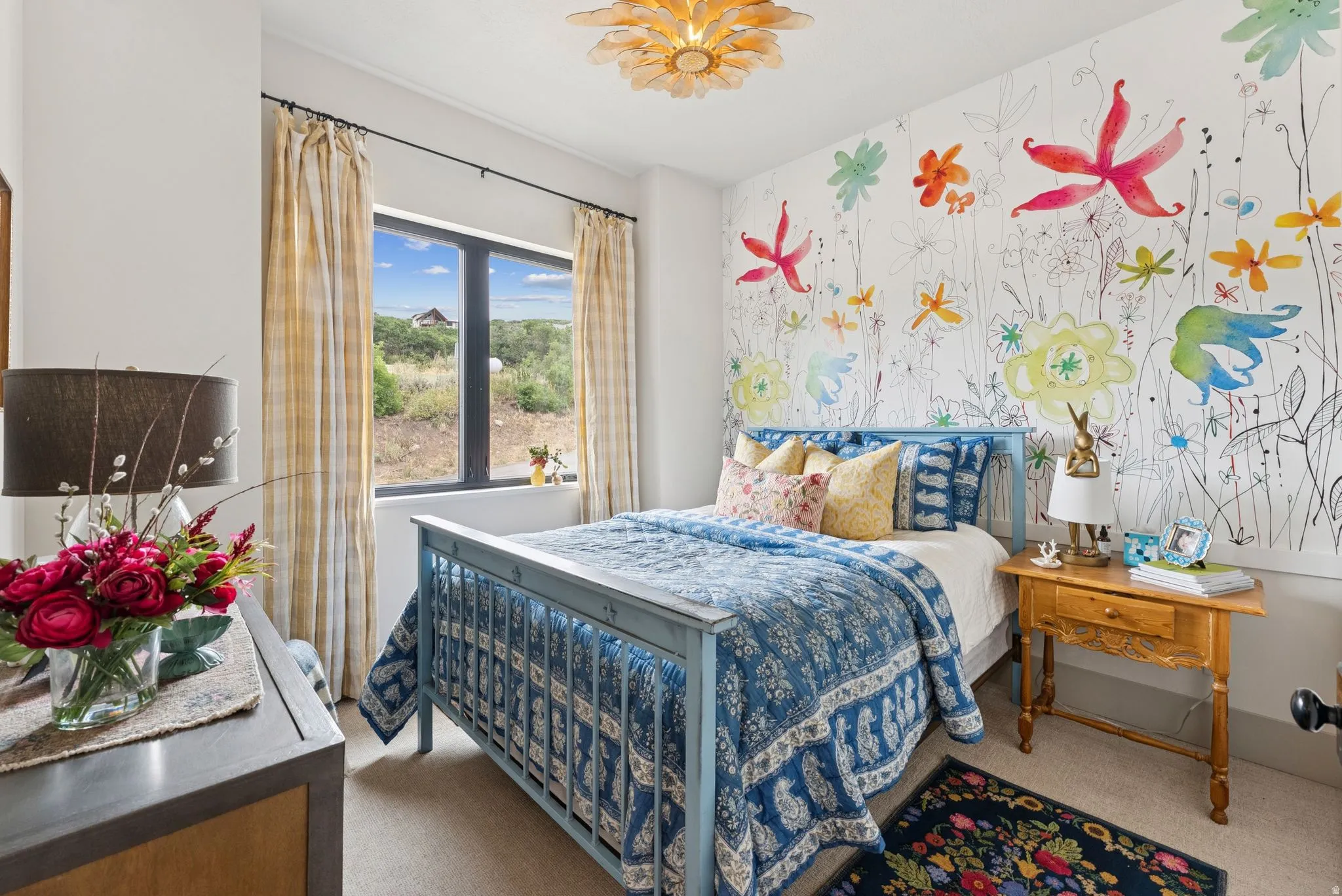 Bedroom with carpet and wallpapered walls
