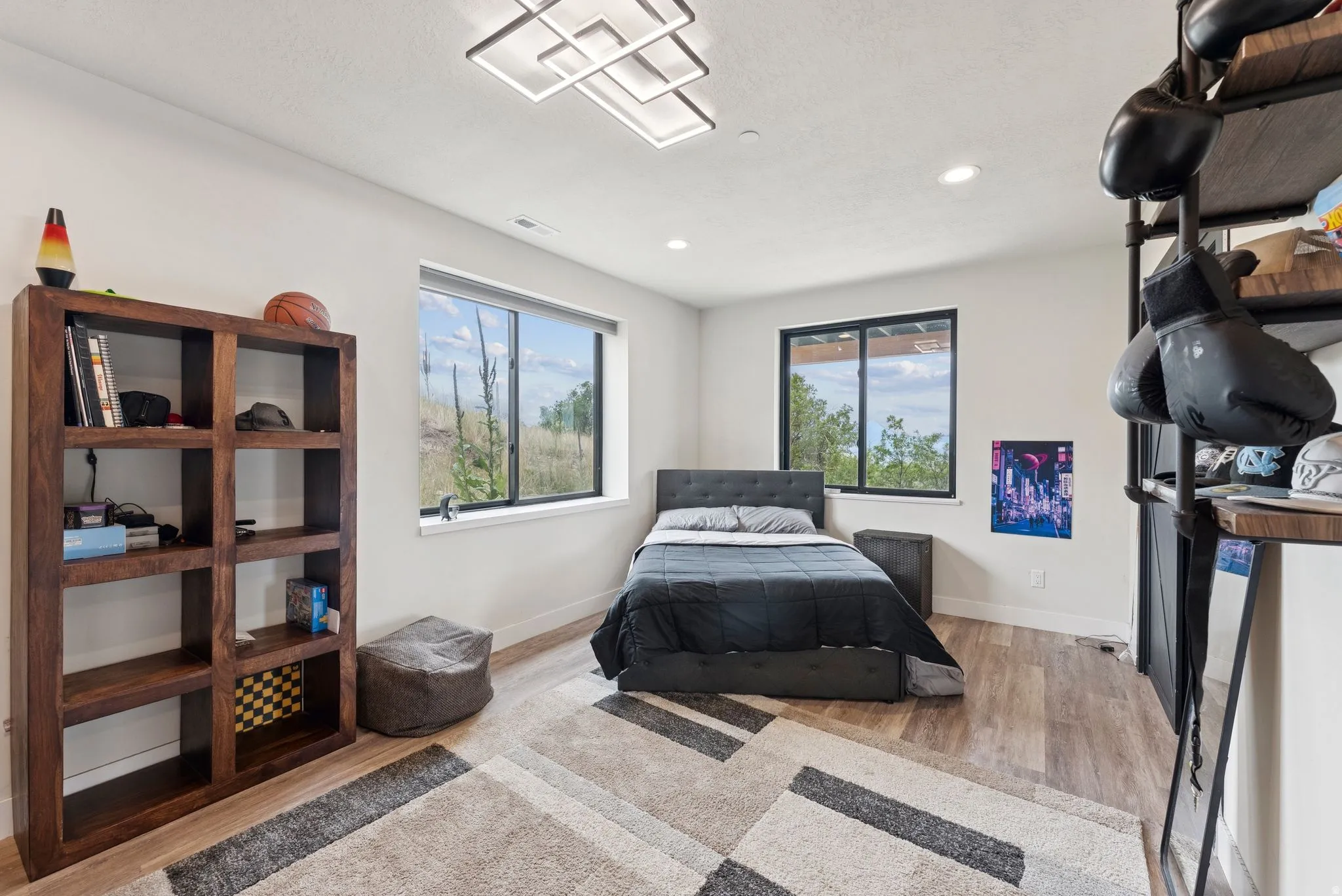 Bedroom featuring light wood-style floors and recessed lighting