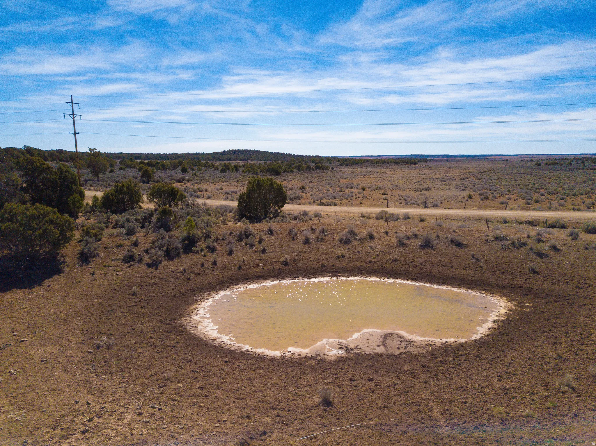 stock pond on the south end of the property by Old Highway Road and the well