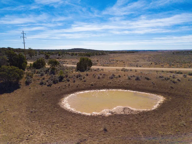 stock pond on the south end of the property by Old Highway Road and the well