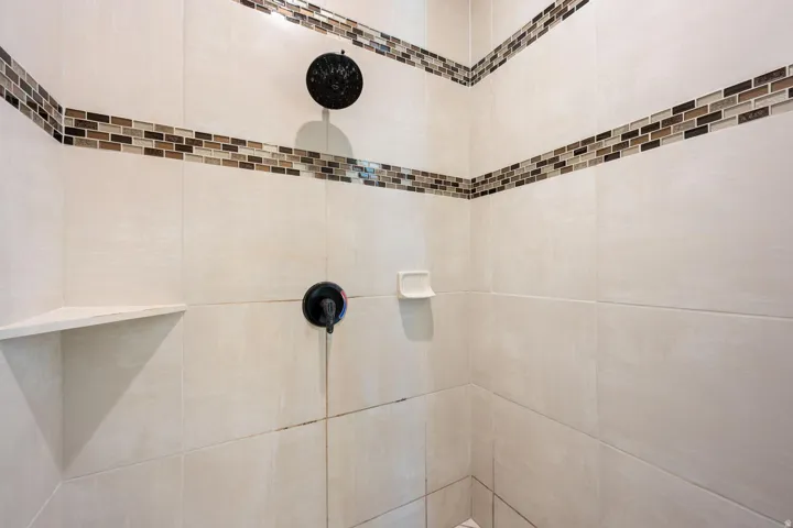 Bathroom view of tiled shower