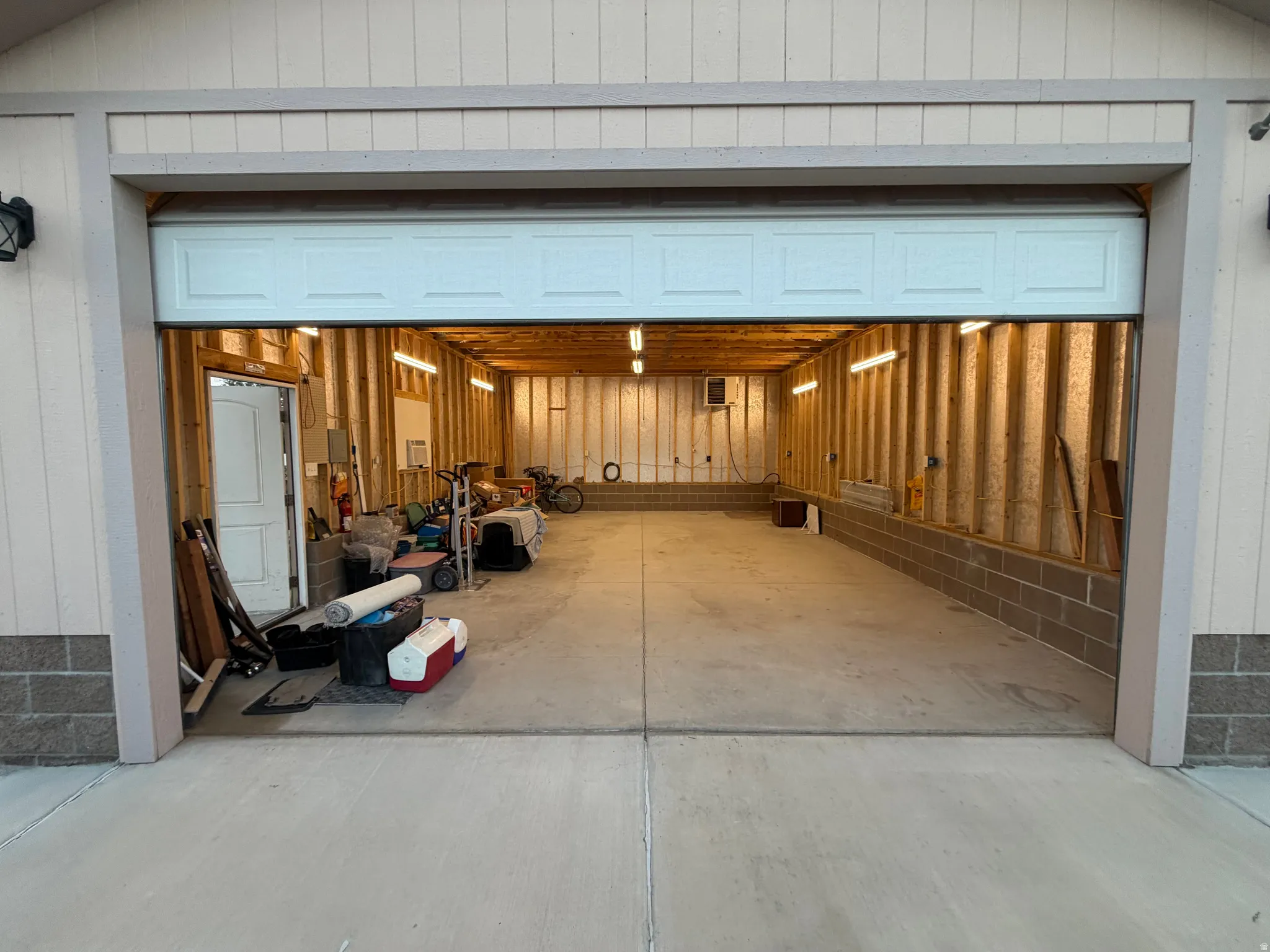 Spacious garage with concrete flooring