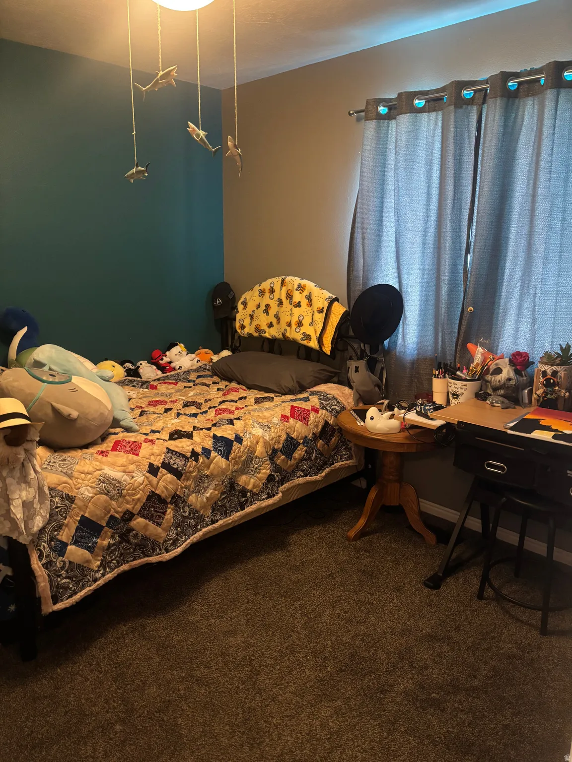 Bedroom with dark colored carpet