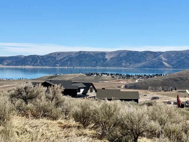 Mountain view featuring a nearby body of water