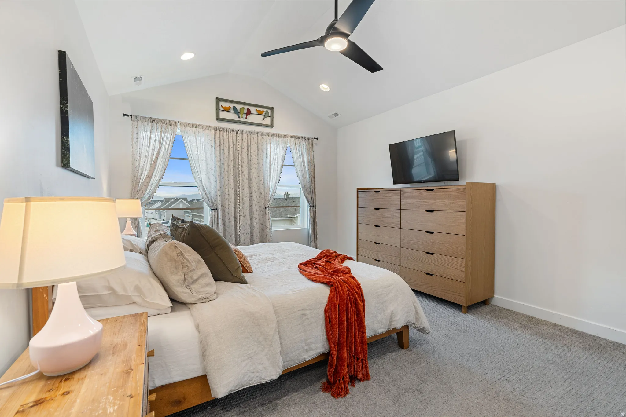 Primary Bedroom featuring carpet floors and ceiling fan