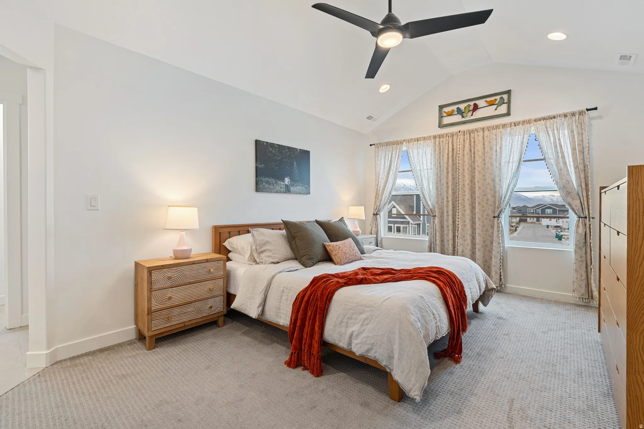 Primary Bedroom featuring ceiling fan, light carpet, and recessed lighting